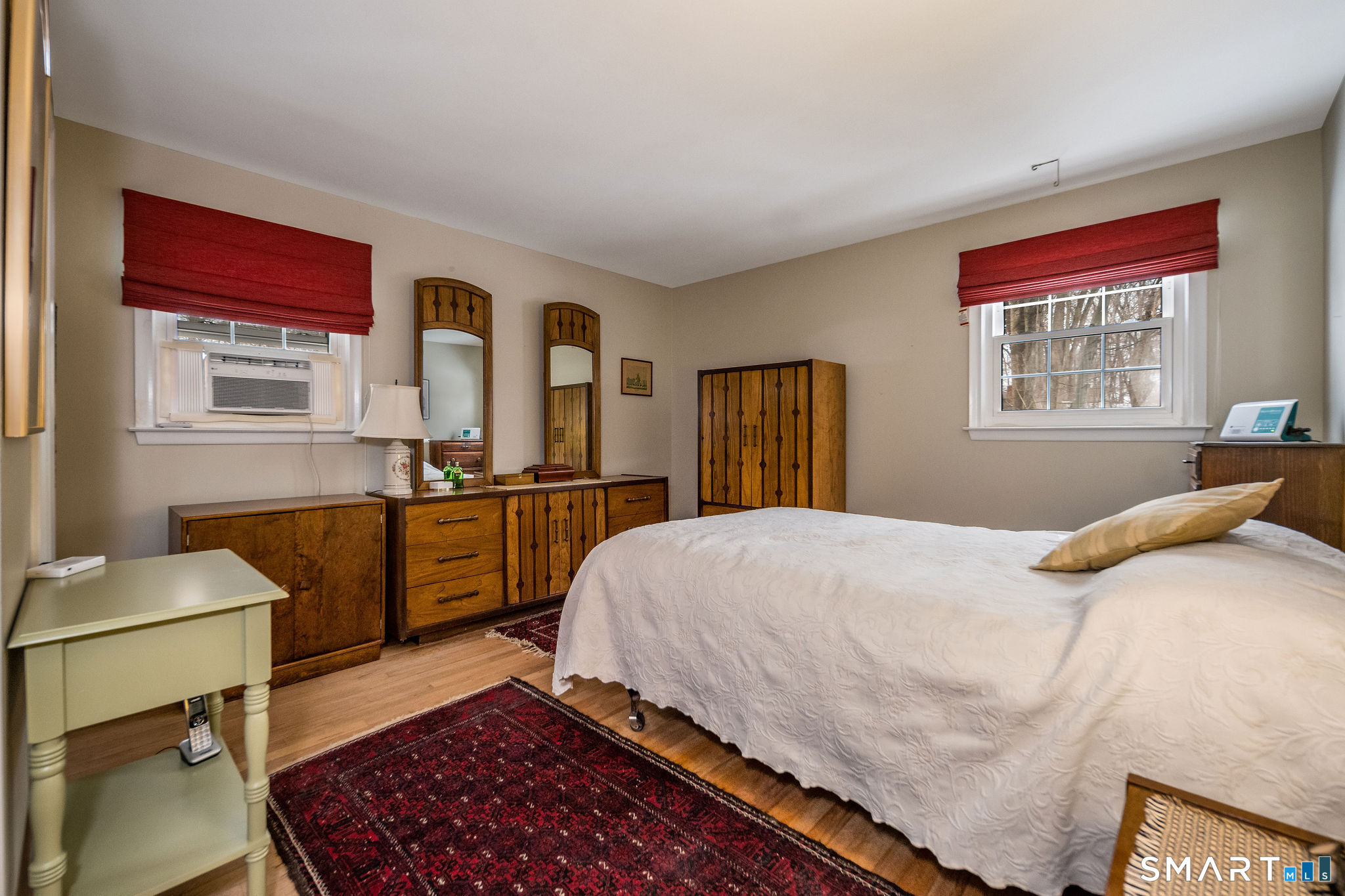 162 Yankee Peddler Path Madison, CT 06443 - Photo 16 of 39 a bedroom with a bed dresser and a window