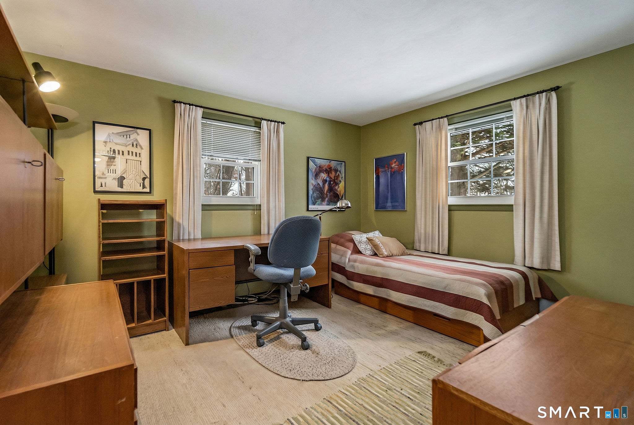 162 Yankee Peddler Path Madison, CT 06443 - Photo 20 of 39 a bedroom with two beds and a window