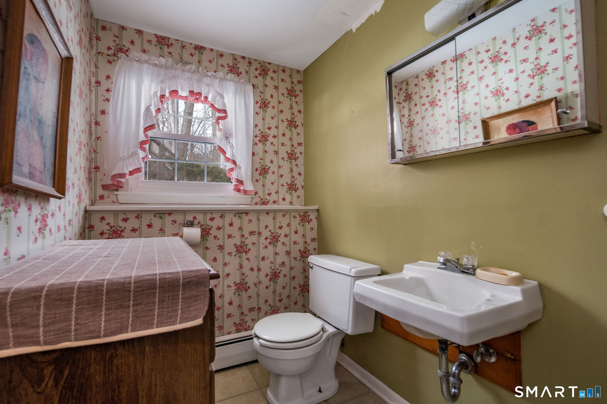 162 Yankee Peddler Path Madison, CT 06443 - Photo 27 of 39 a bathroom with a toilet and a sink