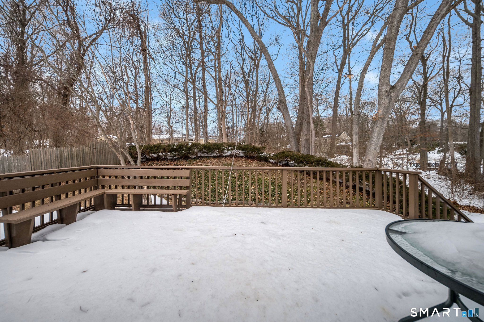 162 Yankee Peddler Path Madison, CT 06443 - Photo 34 of 39 a view of a balcony with trees