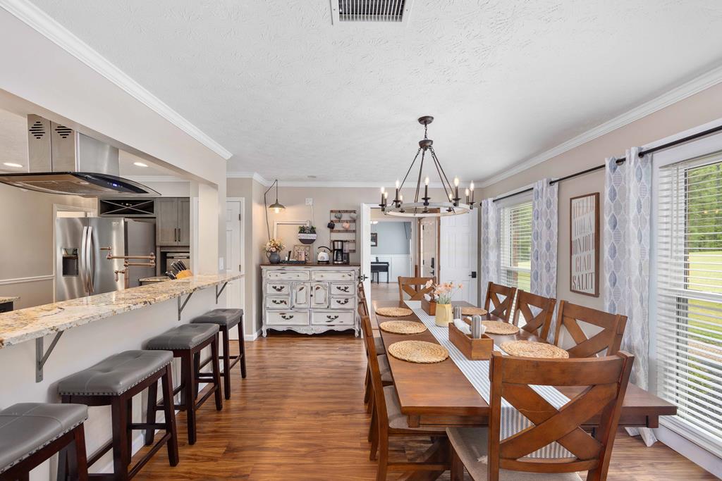 520 Terry Lane Fortson, GA 31808 - Photo 2 of 52 a view of a dining room with furniture window and wooden floor