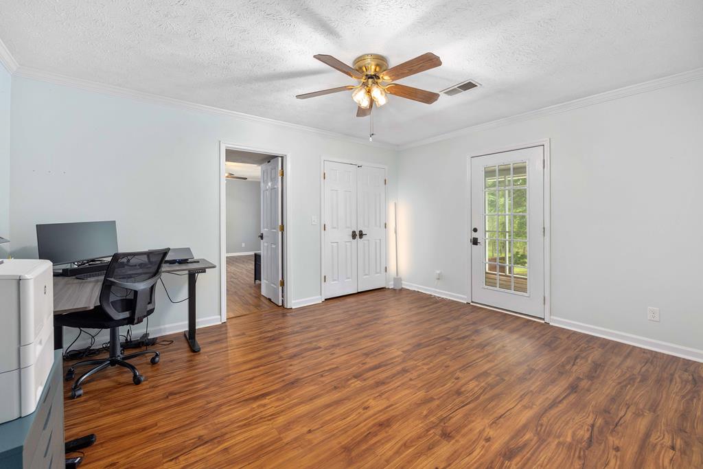 520 Terry Lane Fortson, GA 31808 - Photo 26 of 52 a view of workspace with wooden floor and windows