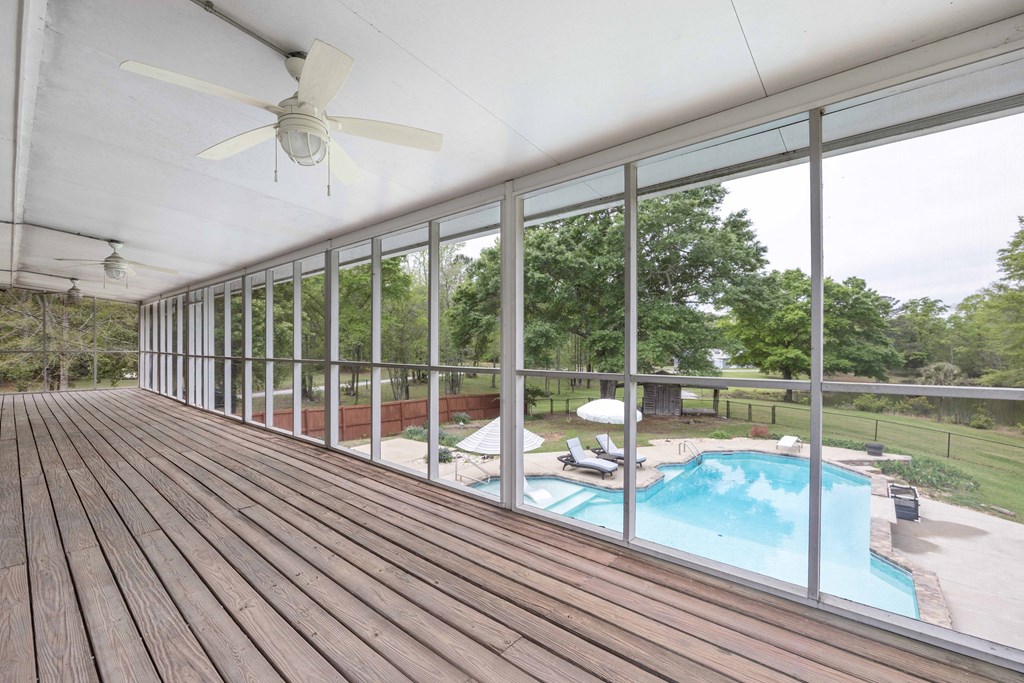 520 Terry Lane Fortson, GA 31808 - Photo 27 of 52 a view of a living room and floor to ceiling windows