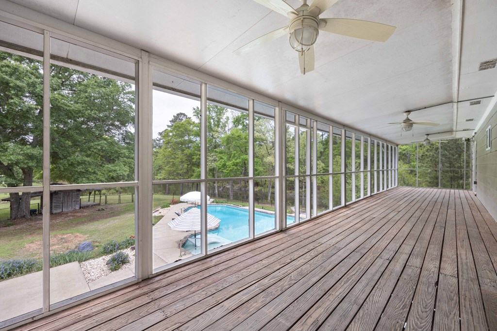 520 Terry Lane Fortson, GA 31808 - Photo 28 of 52 a view of a room with wooden floor and iron stairs