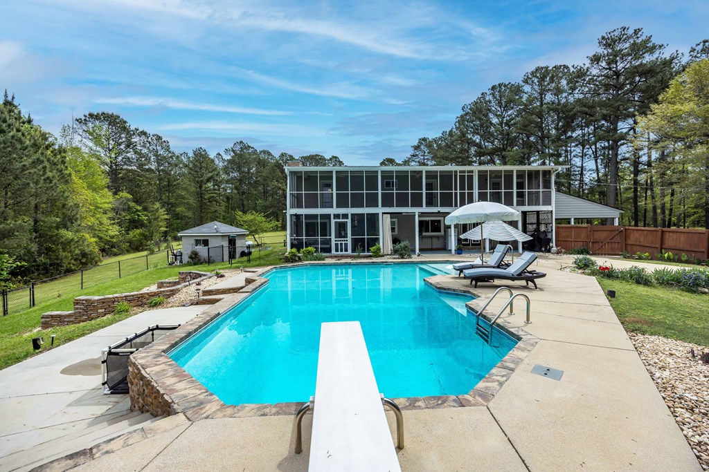 520 Terry Lane Fortson, GA 31808 - Photo 33 of 52 a view of a swimming pool with a patio