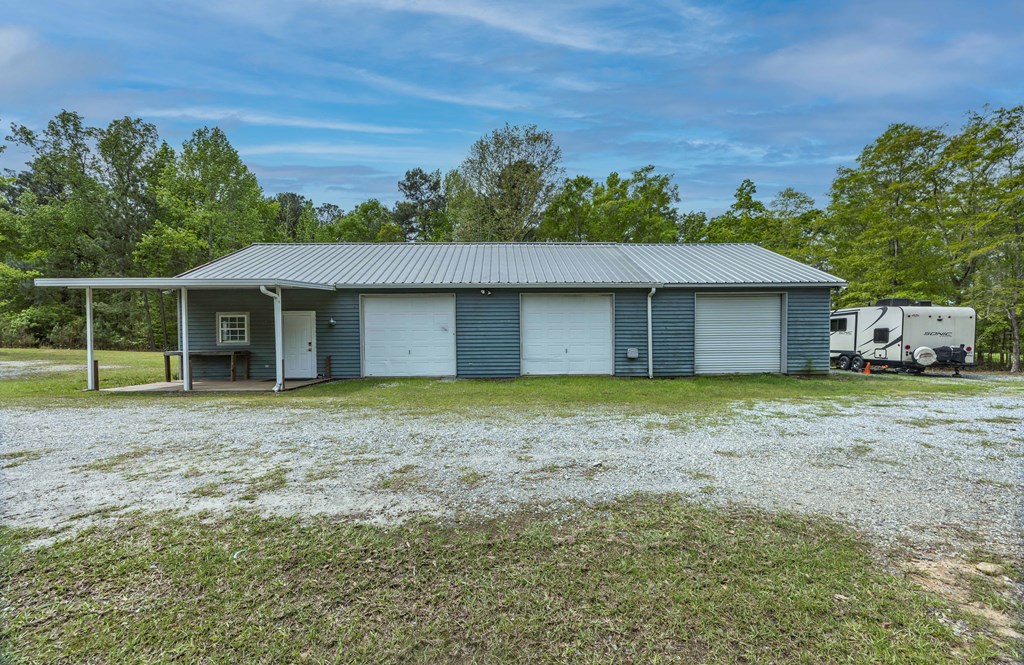 520 Terry Lane Fortson, GA 31808 - Photo 39 of 52 a house with trees in the background