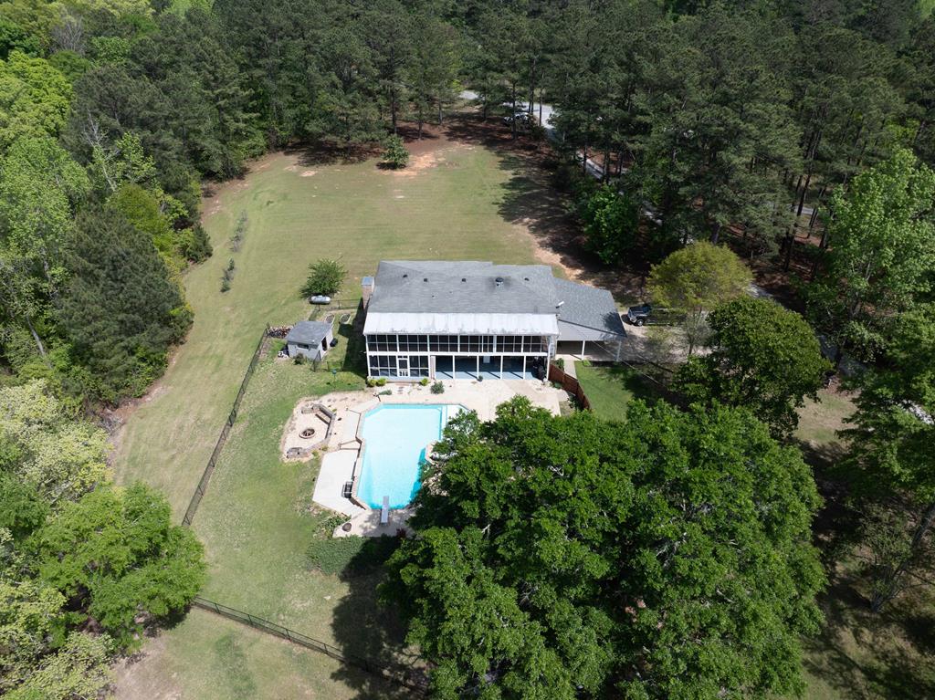 520 Terry Lane Fortson, GA 31808 - Photo 51 of 52 an aerial view of a house with a garden and lake view