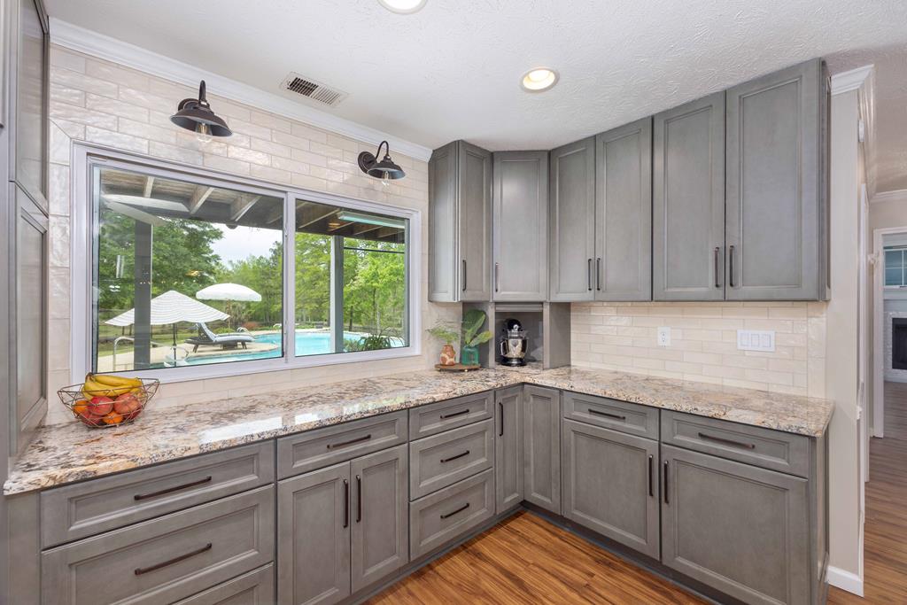 520 Terry Lane Fortson, GA 31808 - Photo 9 of 52 a kitchen with a sink window and cabinets