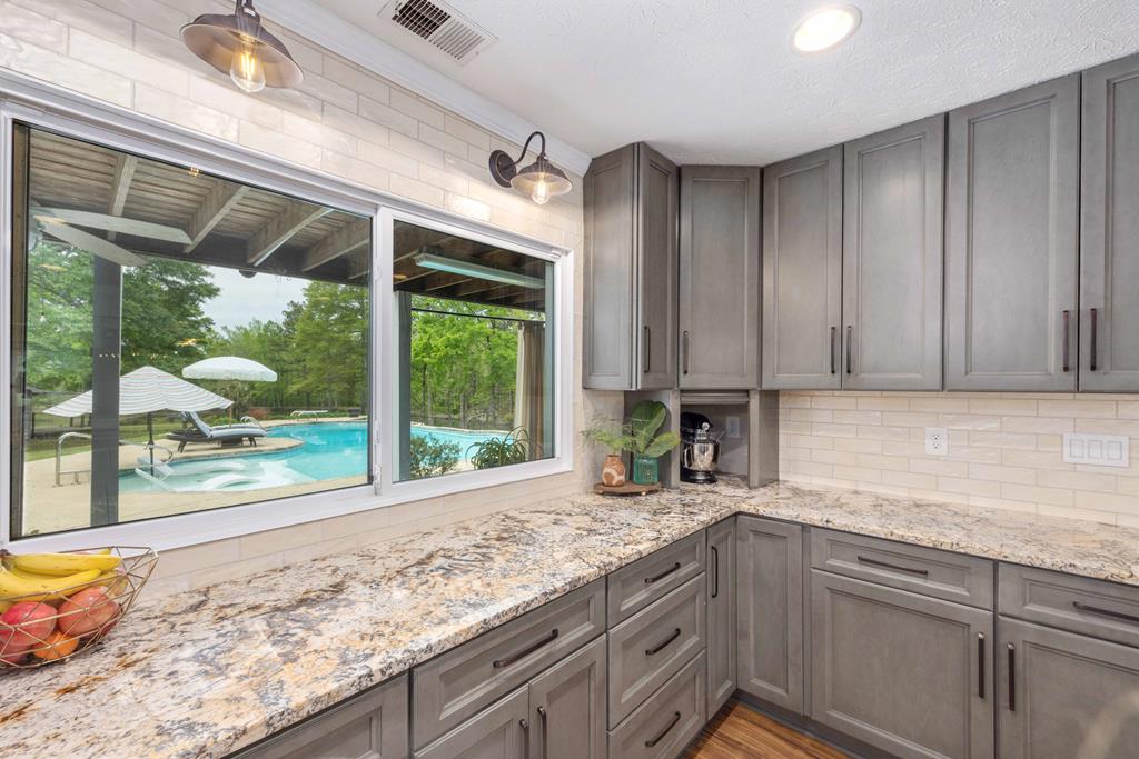520 Terry Lane Fortson, GA 31808 - Photo 10 of 52 a kitchen with a sink and large window