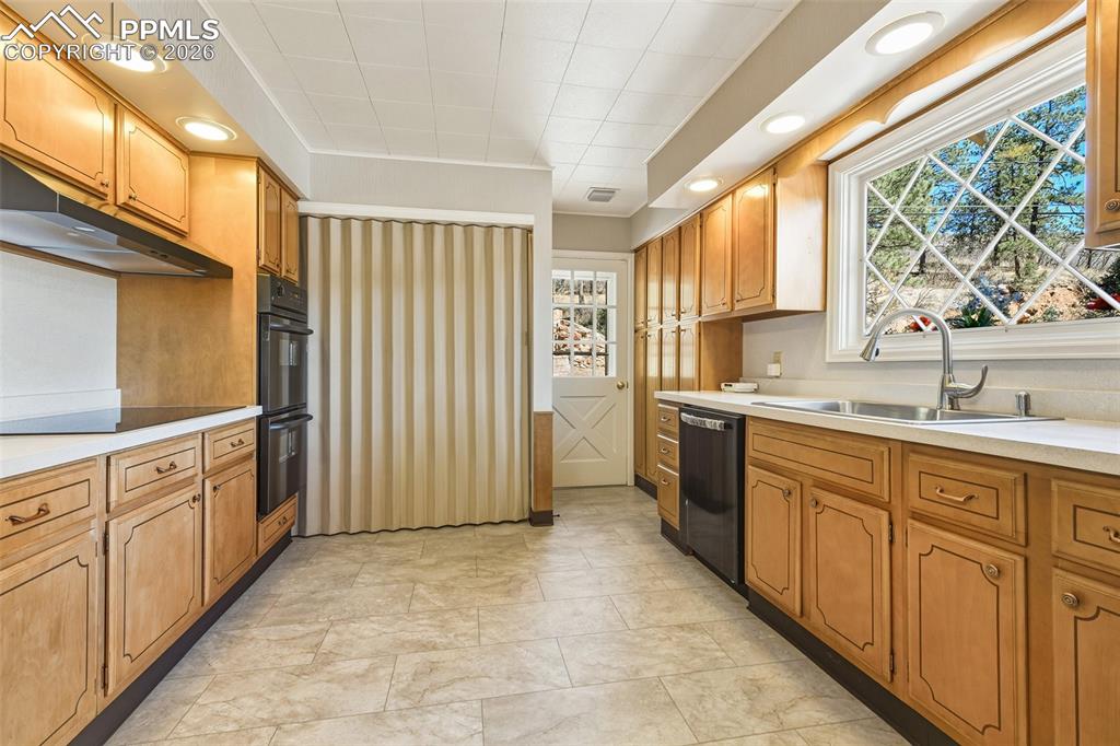 4530 Hagerman Road Cascade, CO 80809 - Photo 19 of 47 Kitchen With View Of Entry Door