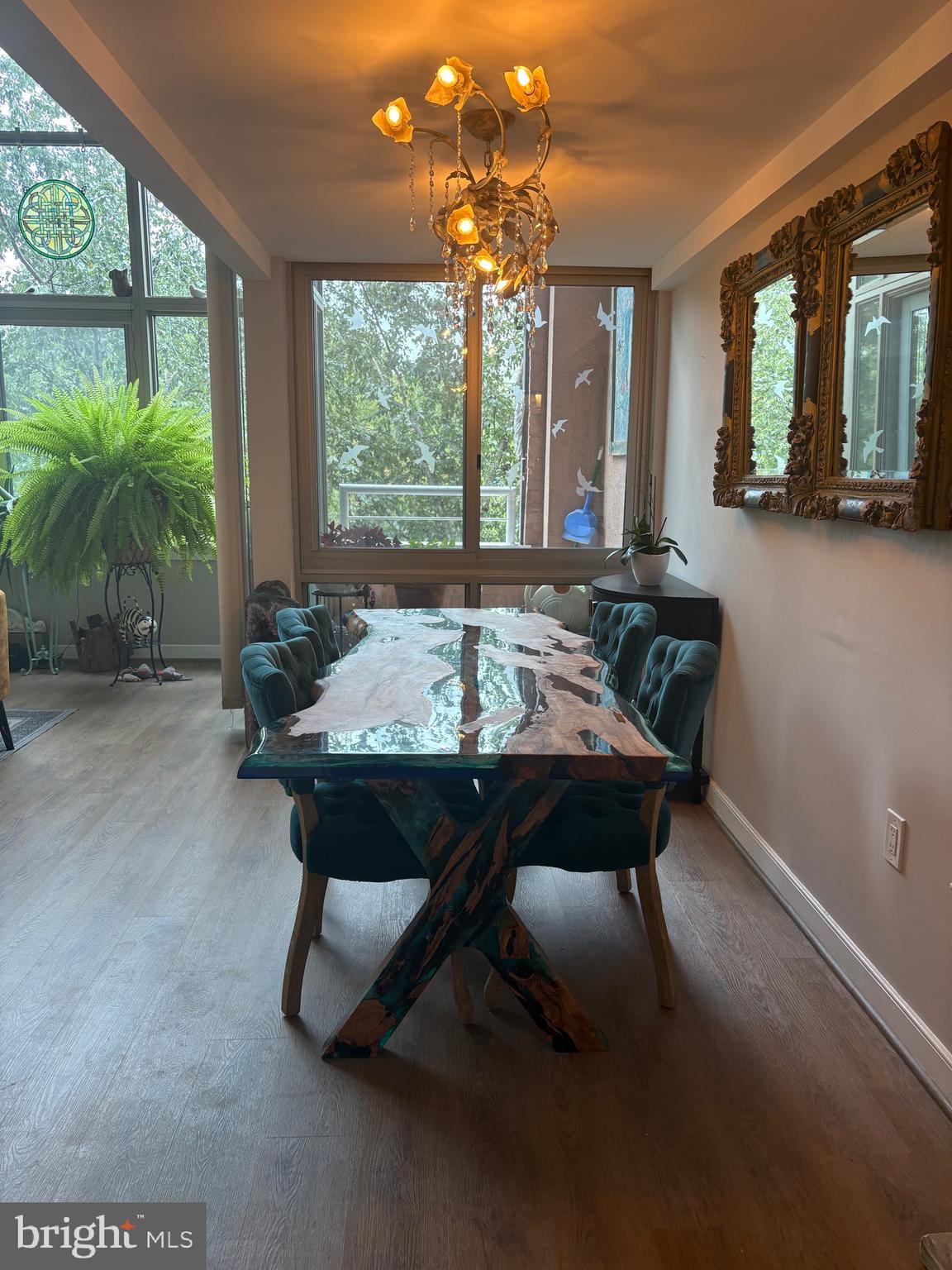 2901 Boston Street, Unit 206 Baltimore, MD 21224 - Photo 23 of 63 a view of a dining room with furniture window and outside view