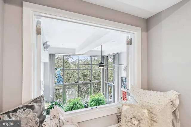 a bathroom with a toilet and shower