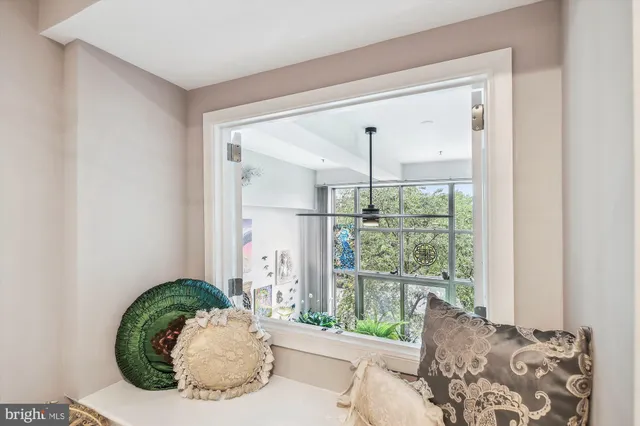 a bathroom with a sink a toilet and shower curtain