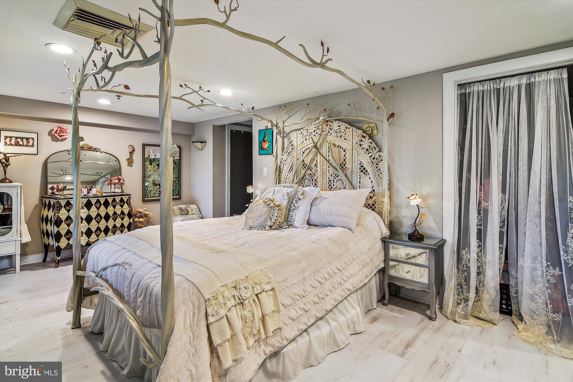 2901 Boston Street, Unit 206 Baltimore, MD 21224 - Photo 31 of 65 a bedroom with a bed and walk in closet