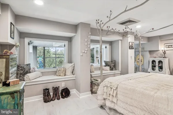 a bathroom with a shower and a sink
