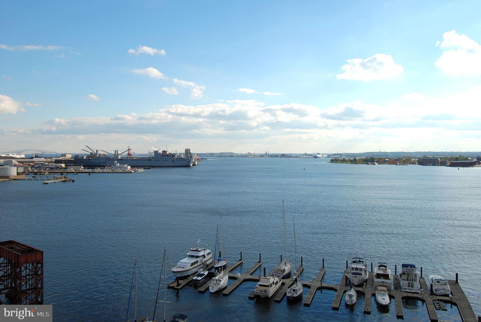 2901 Boston Street, Unit 206 Baltimore, MD 21224 - Photo 47 of 65 a view of a terrace with lawn chairs