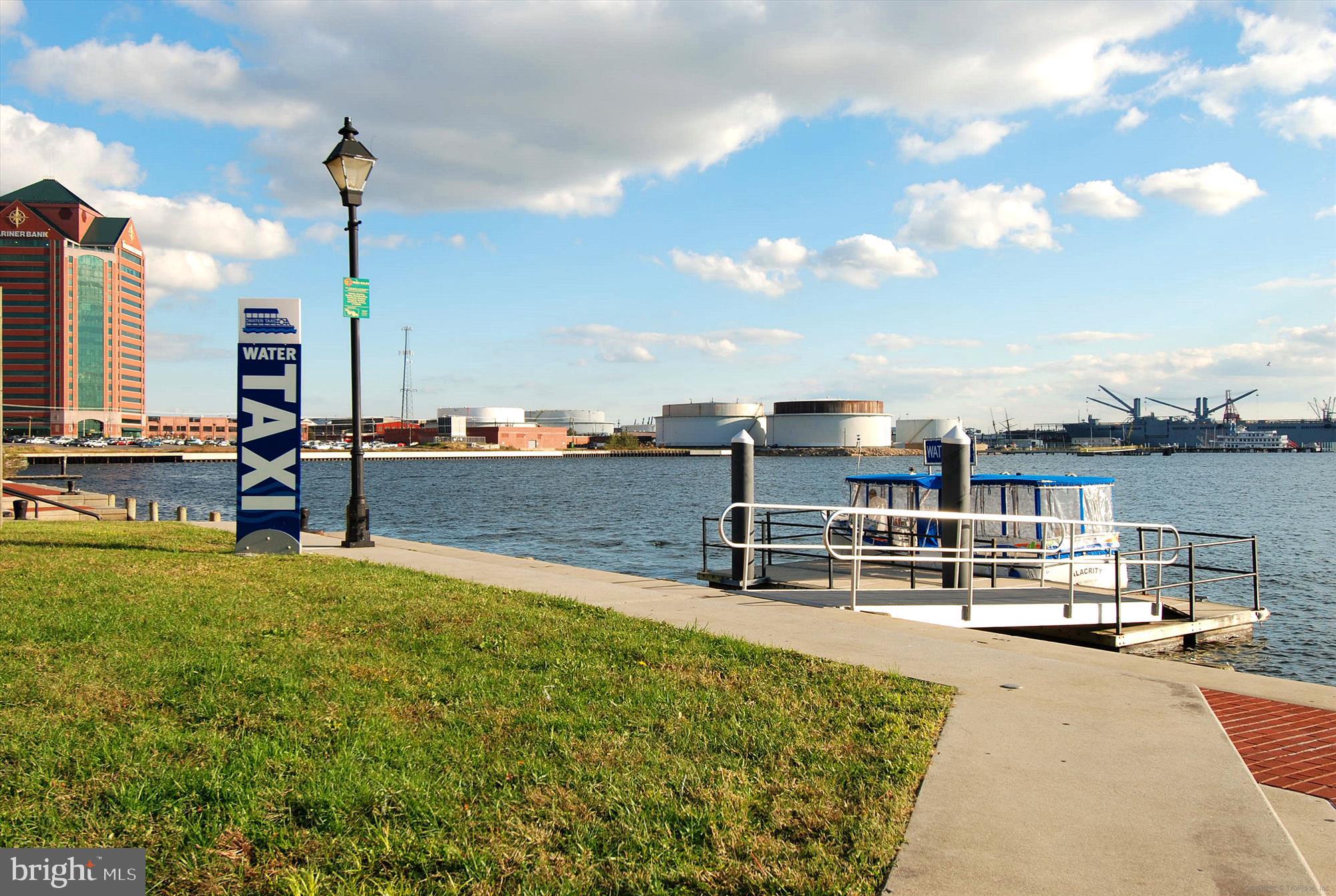 2901 Boston Street, Unit 206 Baltimore, MD 21224 - Photo 58 of 65 a view of a terrace with lawn chairs