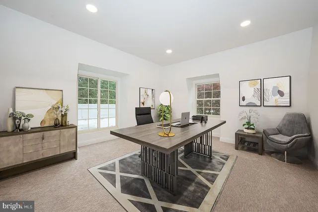 a view of a livingroom with furniture and window
