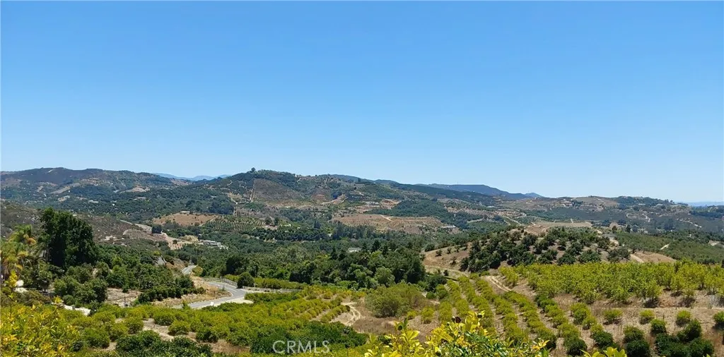 5 De Anza Road Temecula, CA 92590 - Photo 13 of 28 a view of a mountain range with lush green forest
