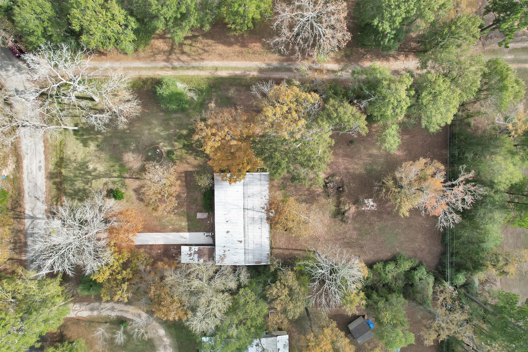 75 South Pavey Circle New Waverly, TX 77358 - Photo 20 of 21 an aerial view of a house with a yard
