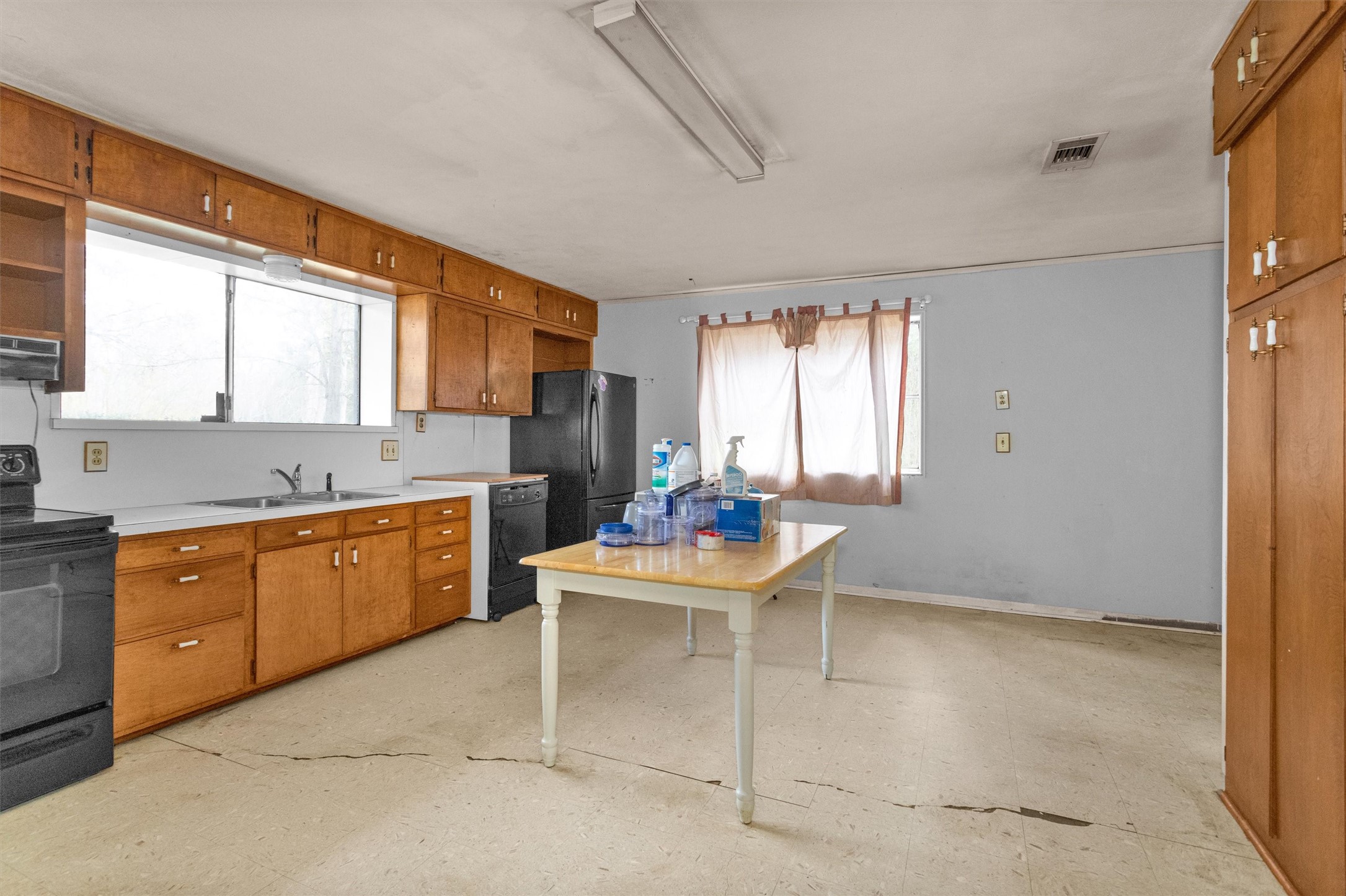 75 South Pavey Circle New Waverly, TX 77358 - Photo 10 of 21 a dining room with a window furniture and wooden floor