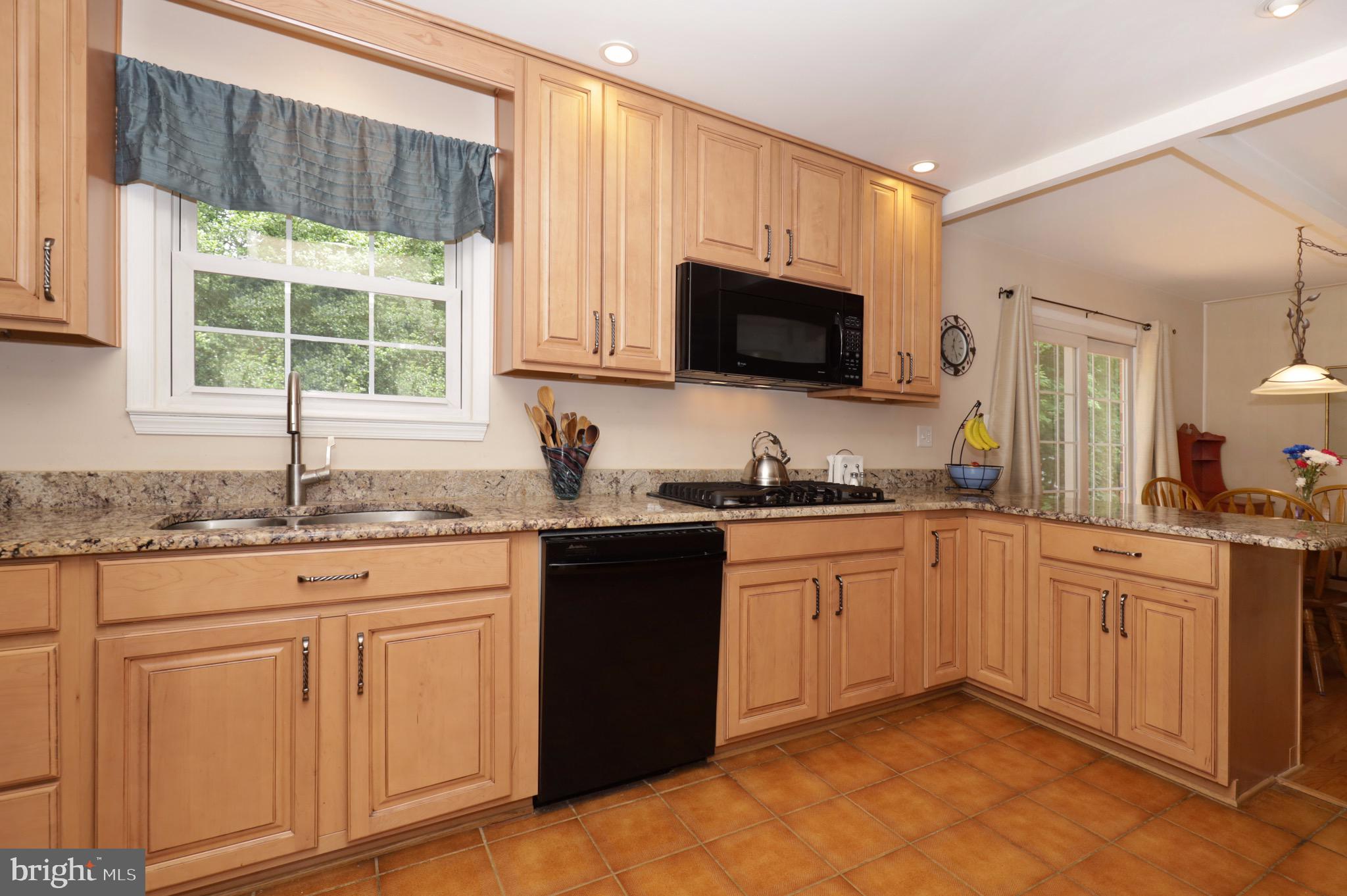 6815 Sydenstricker Road Springfield, VA 22152 - Photo 14 of 47 Lots of Natural Sunlight and Granite Counters