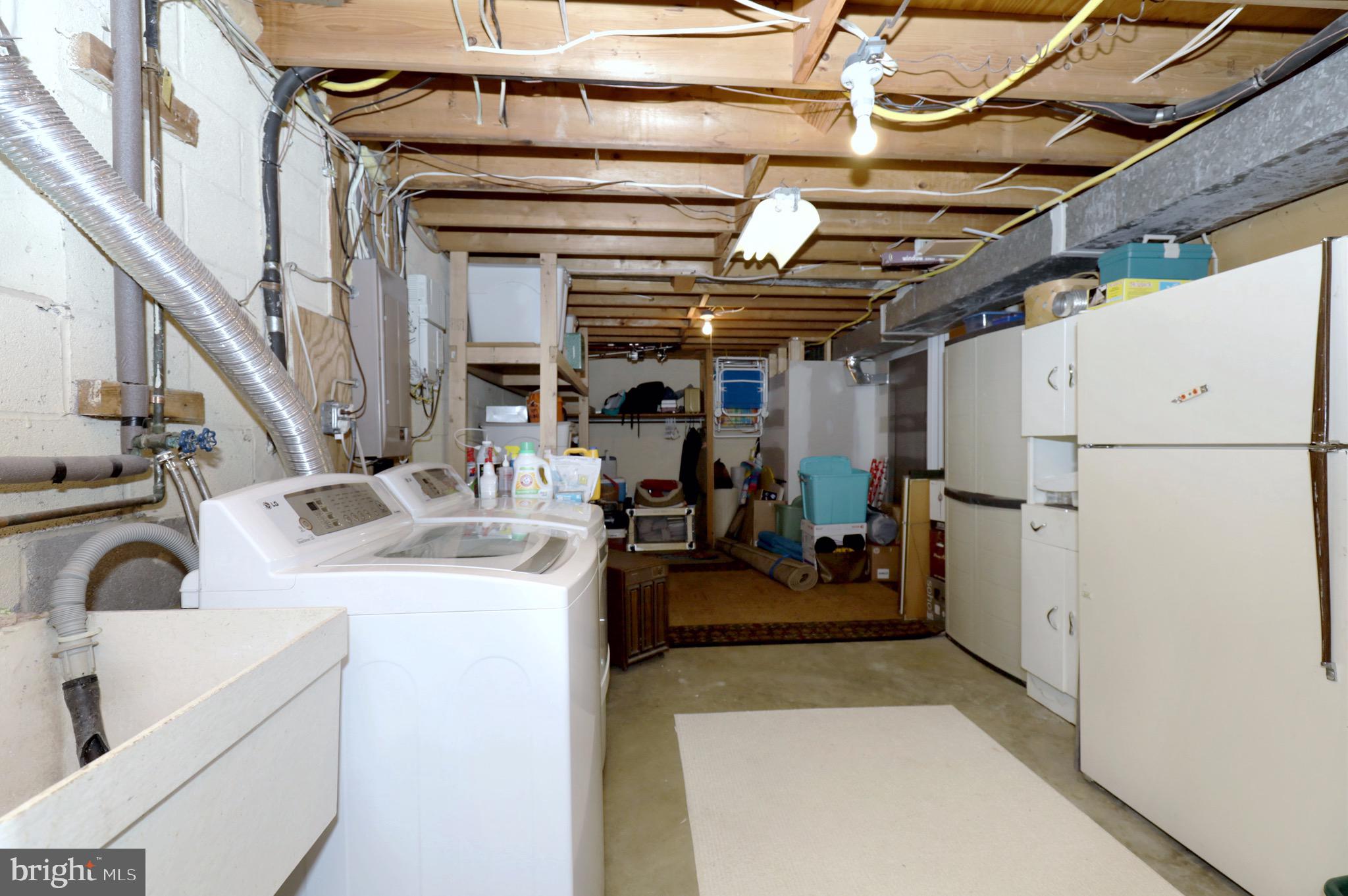 6815 Sydenstricker Road Springfield, VA 22152 - Photo 40 of 47 Laundry Room, Deep Sink and Lots of Storage Space