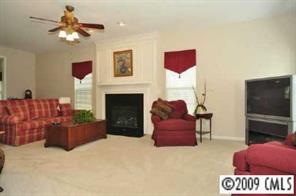 457 St George Road Fort Mill, SC 29708 - Photo 4 of 8 a living room with furniture and a fireplace