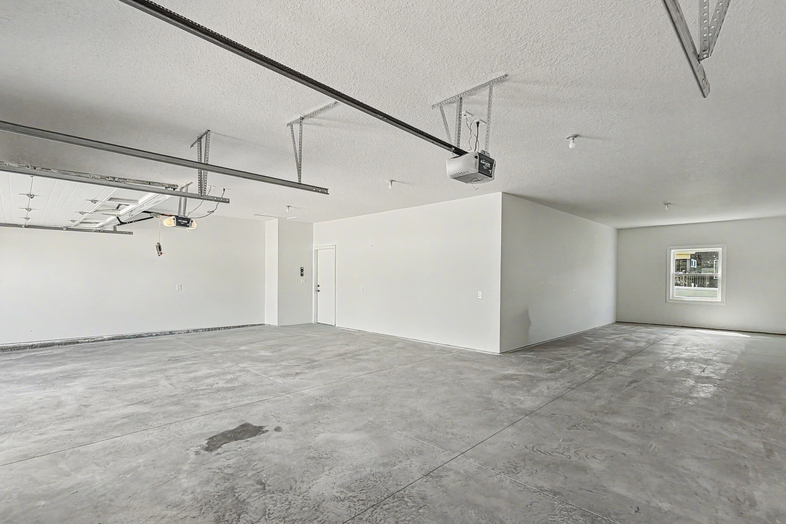 606 Kevin Road Blue Grass, IA 52726 - Photo 5 of 33 a view of a big room with an entryway