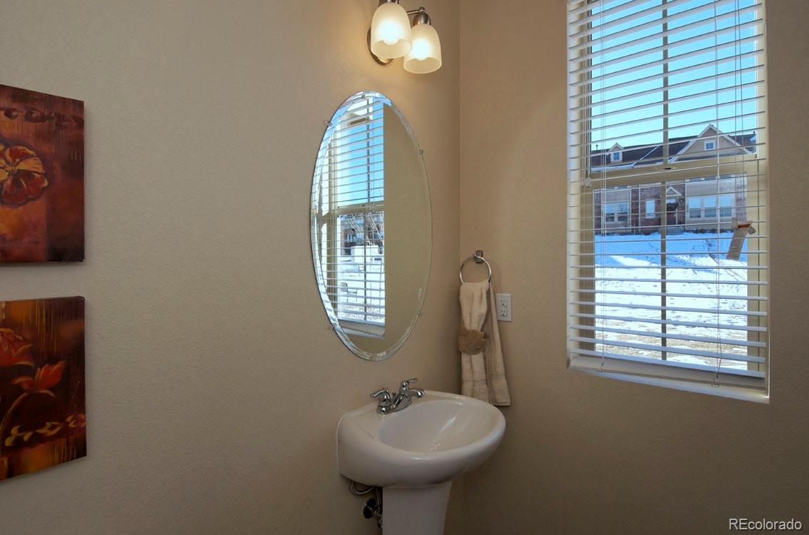 10296 Bellwether Lane Lone Tree, CO 80124 - Photo 13 of 29 a bathroom with a sink and a window