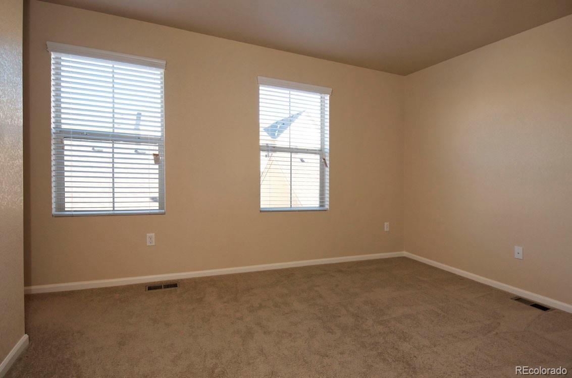 10296 Bellwether Lane Lone Tree, CO 80124 - Photo 15 of 29 an empty room with a window