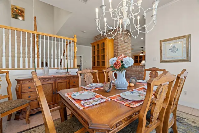 a bedroom with a bed couch and window