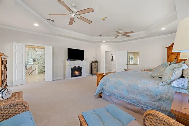 a bedroom with furniture and a window