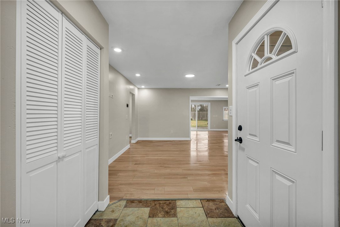 614 Weller Road Elyria, OH 44035 - Photo 10 of 39 Foyer entrance with recessed lighting and stone tile floors
