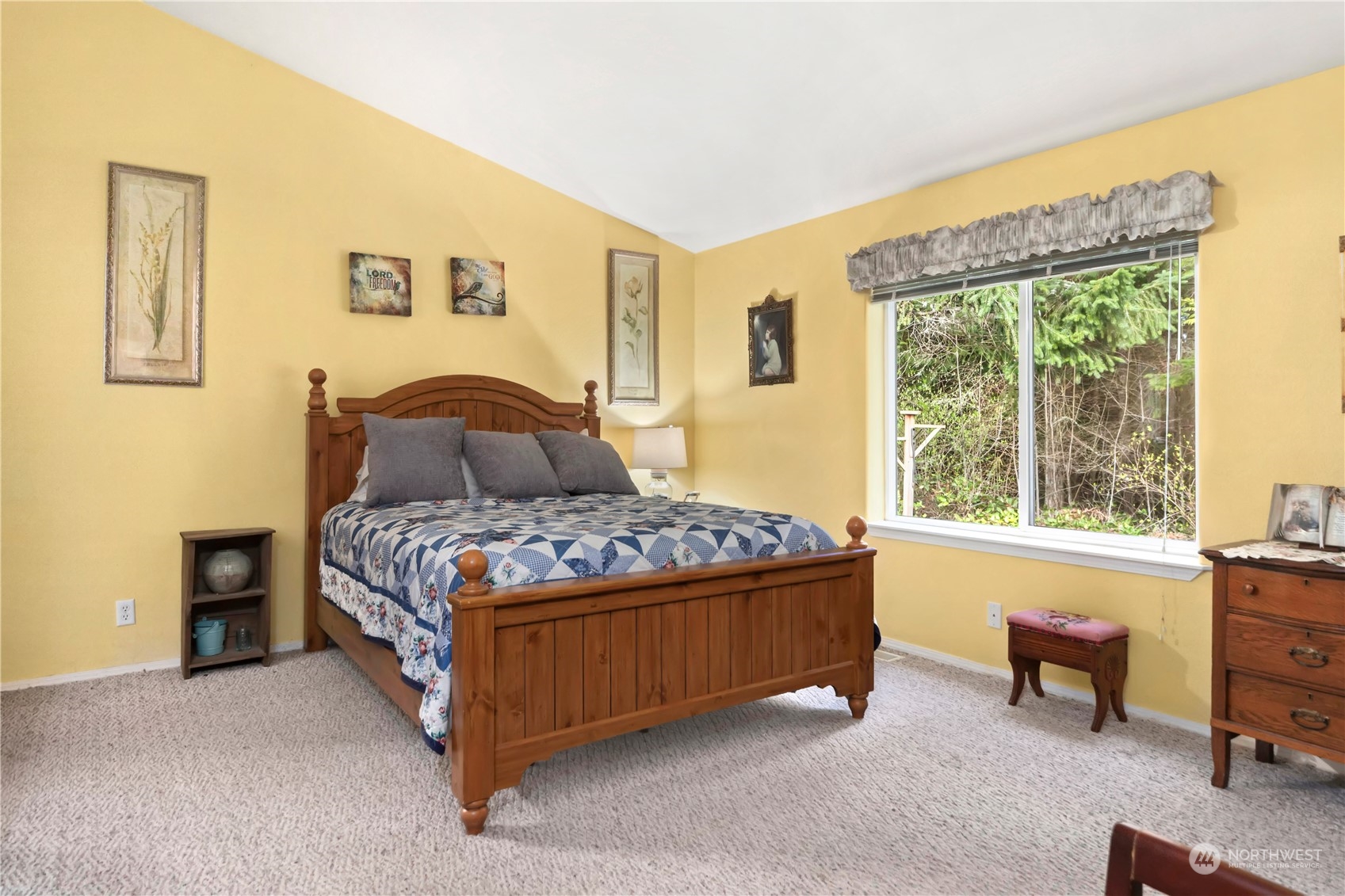 384 Port Hadlock Heights Road Port Hadlock, WA 98339 - Photo 11 of 25 a bedroom with a bed chair and a window