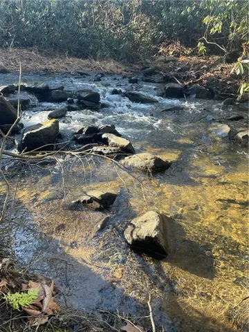 a view of a backyard of a house