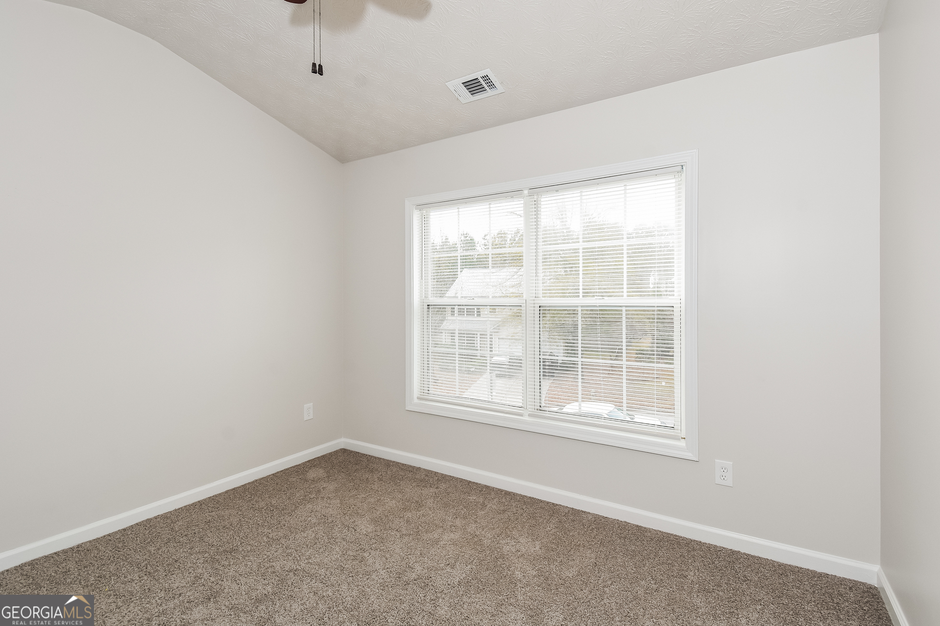 343 Alderman Trace Southwest Austell, GA 30168 - Photo 11 of 17 an empty room with a window