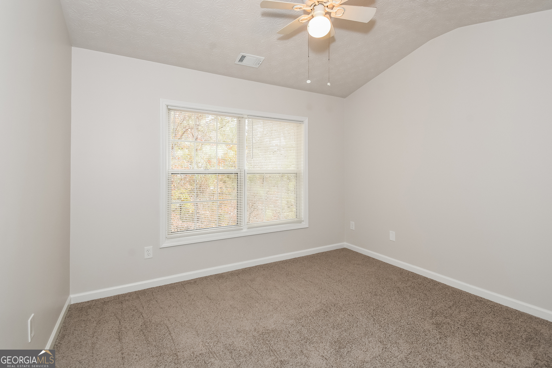 343 Alderman Trace Southwest Austell, GA 30168 - Photo 12 of 17 an empty room with a window