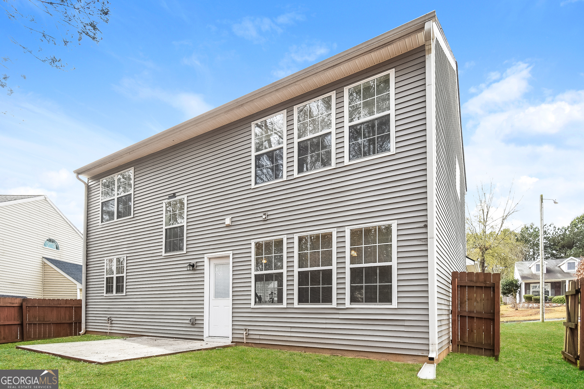 343 Alderman Trace Southwest Austell, GA 30168 - Photo 14 of 17 a front view of a house with a yard