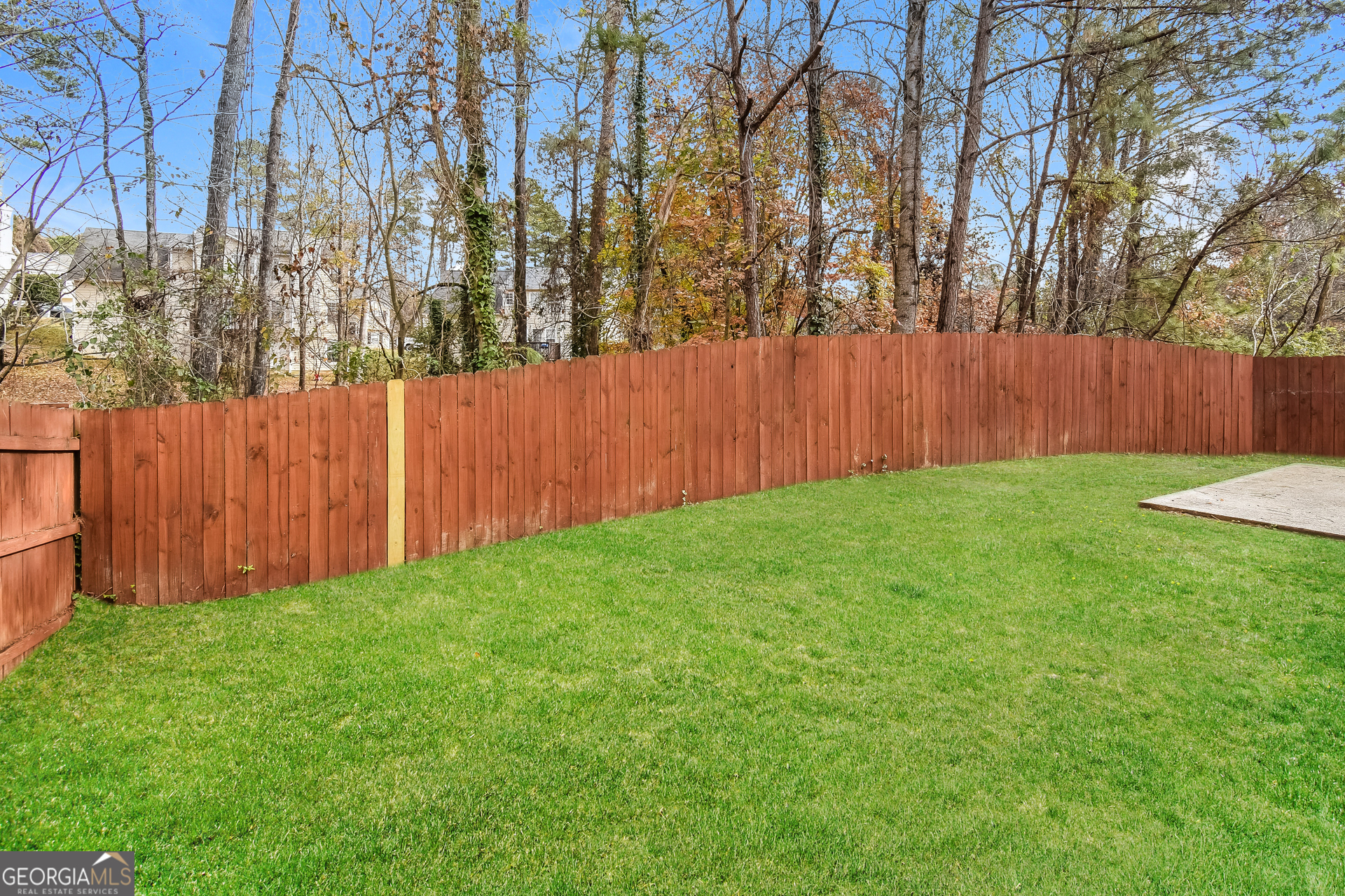 343 Alderman Trace Southwest Austell, GA 30168 - Photo 15 of 17 a view of backyard with wooden fence