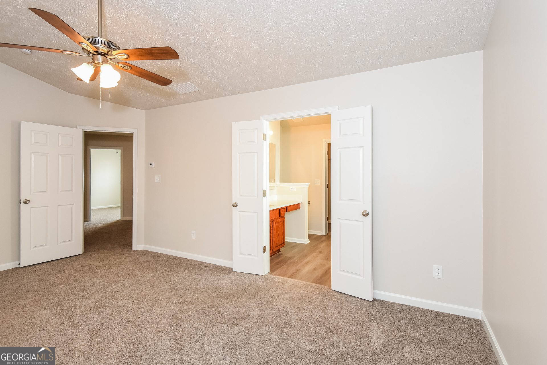 343 Alderman Trace Southwest Austell, GA 30168 - Photo 9 of 17 an empty room with fan and entrance