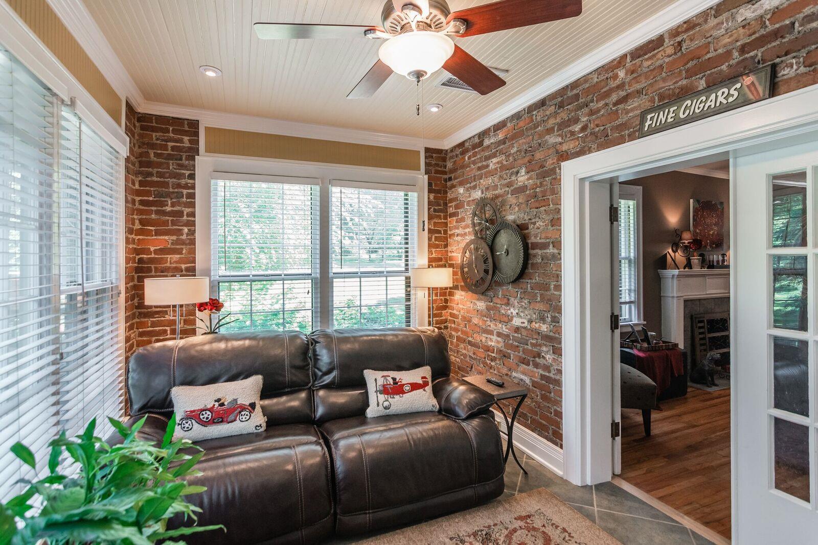 114 Spring Valley Road Nashville, TN 37214 - Photo 13 of 30 a living room with furniture and a floor to ceiling window