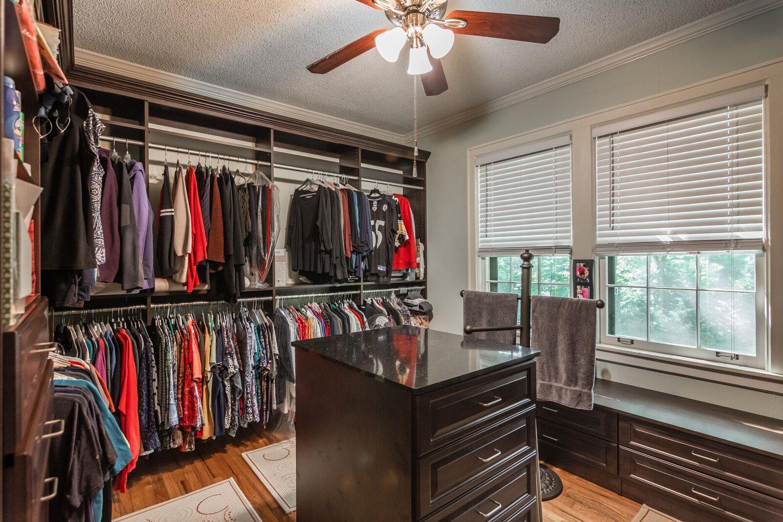 114 Spring Valley Road Nashville, TN 37214 - Photo 15 of 30 a view of walk in closet with clothes and shoes