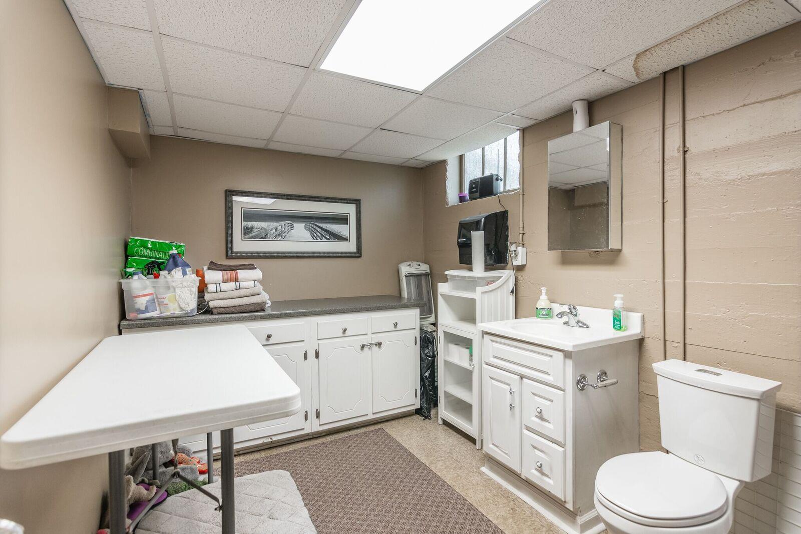 114 Spring Valley Road Nashville, TN 37214 - Photo 24 of 30 a spacious bathroom with a sink a toilet a mirror and shower