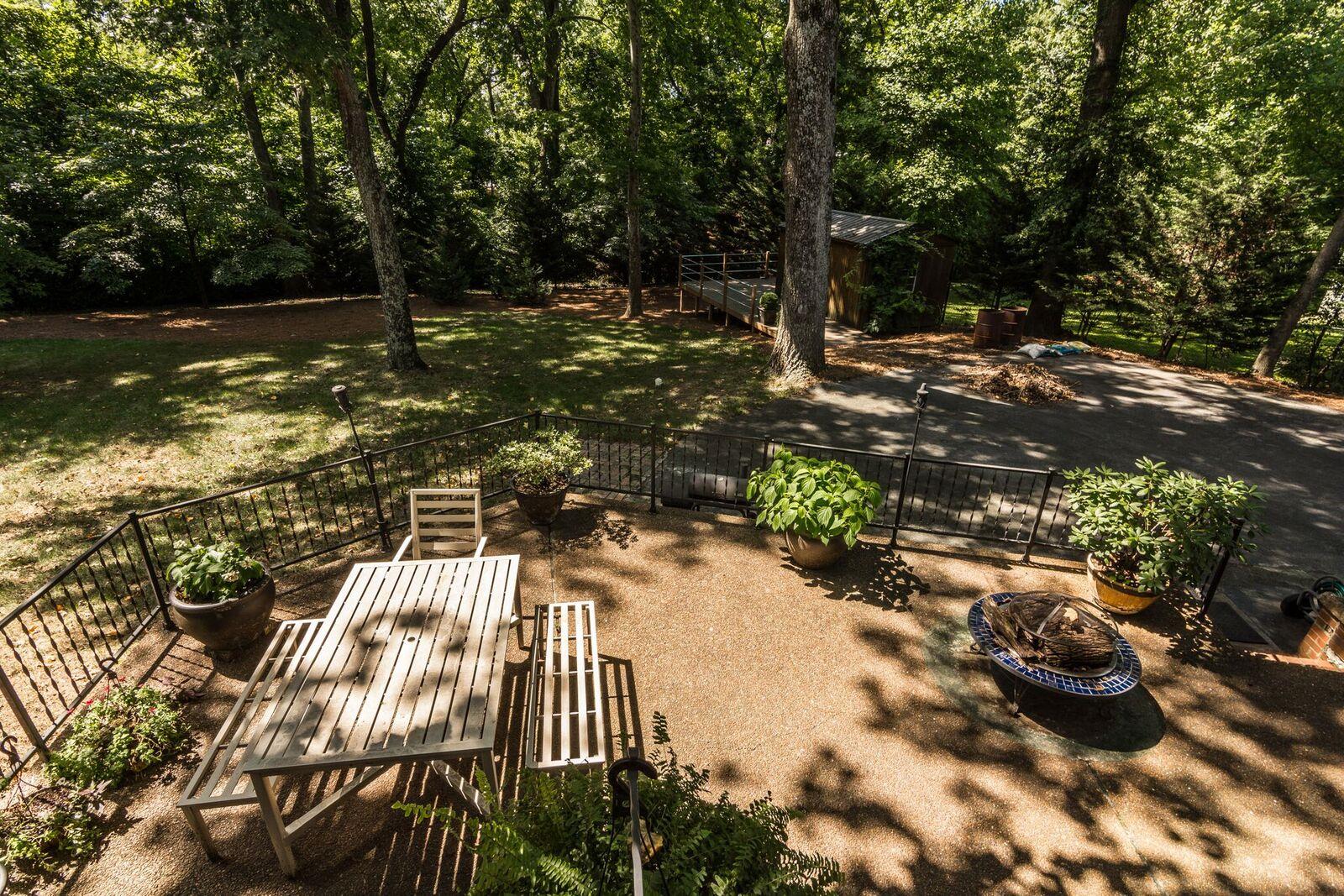 114 Spring Valley Road Nashville, TN 37214 - Photo 27 of 30 a view of a yard with plants and trees