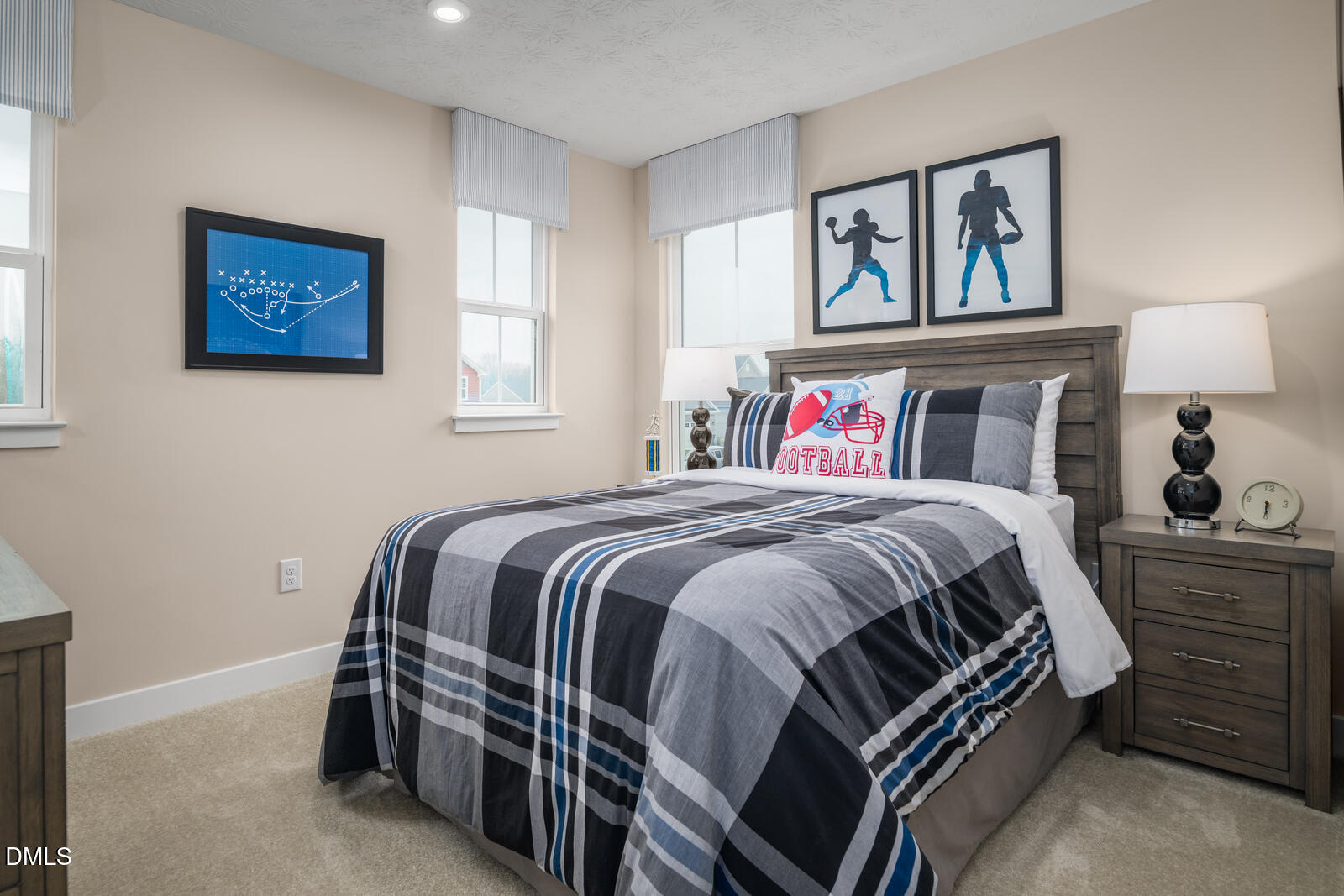 921 Walker Rdg Way Willow Spring, NC 27592 - Photo 18 of 23 a bedroom with a bed and a lamp on dresser