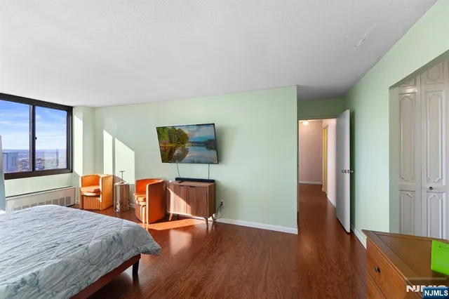 a view of a livingroom with furniture and wooden floor
