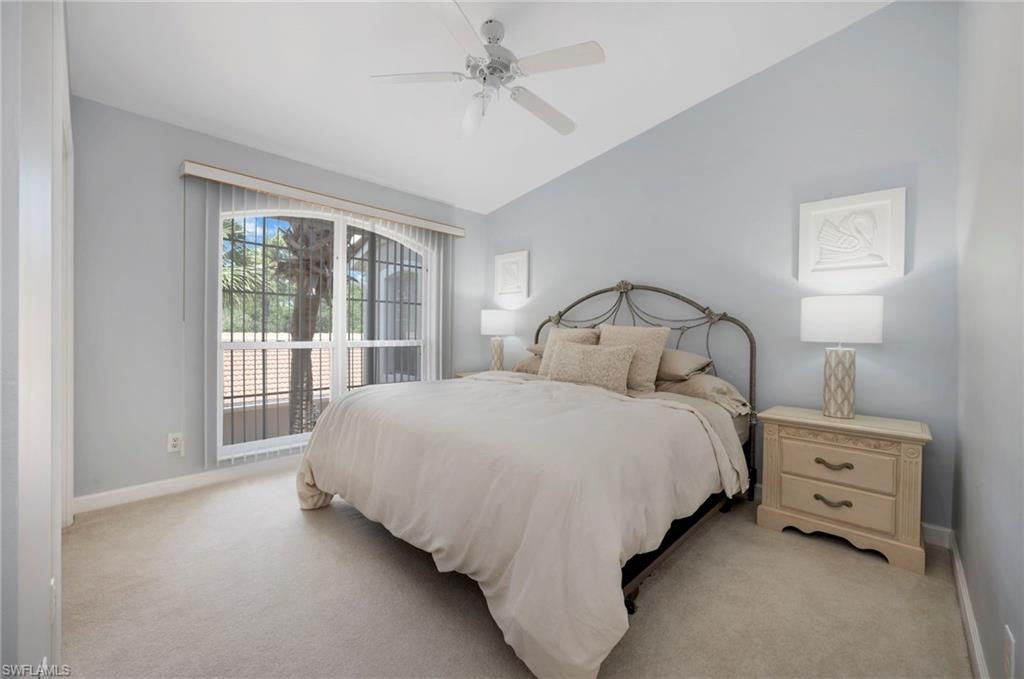 14530 Red Fox Run, Unit 204 Naples, FL 34110 - Photo 12 of 18 a bedroom with a bed and a window