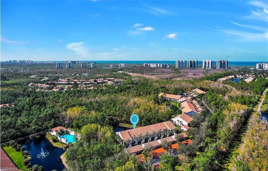 14530 Red Fox Run, Unit 204 Naples, FL 34110 - Photo 16 of 18 an aerial view of multiple house