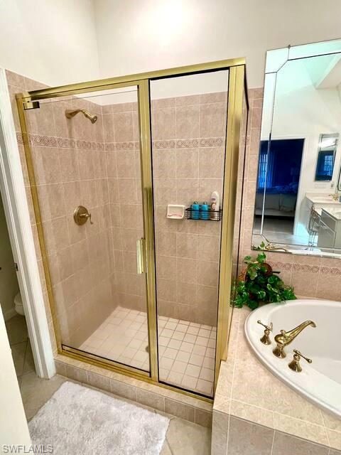 14530 Red Fox Run, Unit 204 Naples, FL 34110 - Photo 10 of 18 a bathroom with a shower and a sink